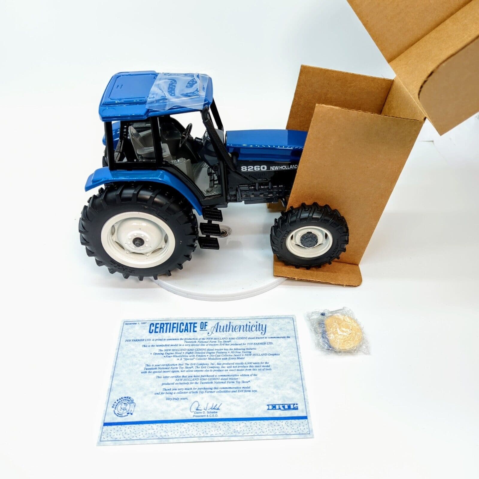 1/16 New Holland 8260 Tractor, 1997 Toy Farmer Show Edition.