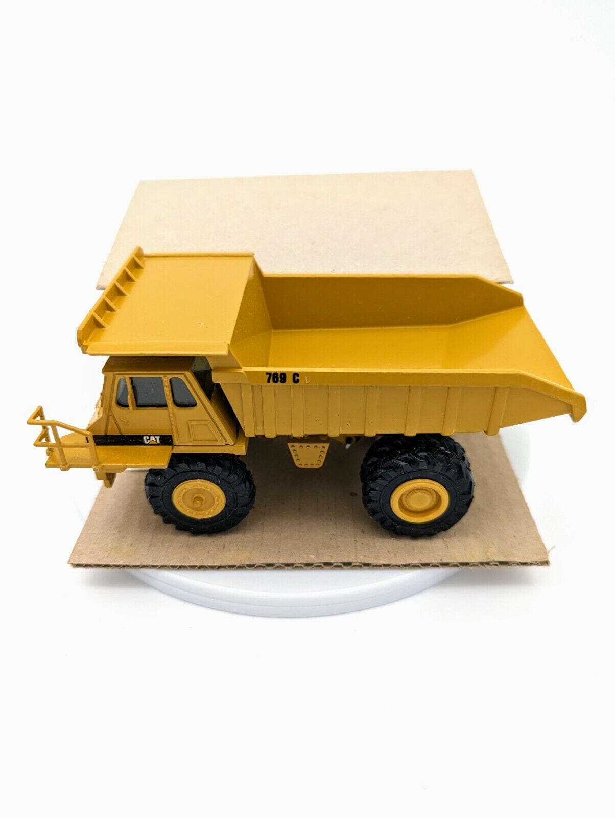 NZG Caterpillar 769C Dump Truck 1/50 - NO. 222 w/ box.