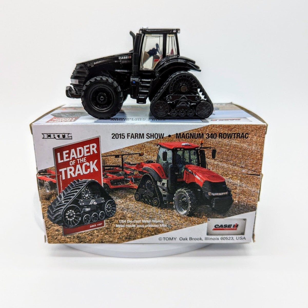 1/64 Case IH Magnum 340 Rowtrac Tractor, 2015 Farm Show, Black Chrome Chaser.