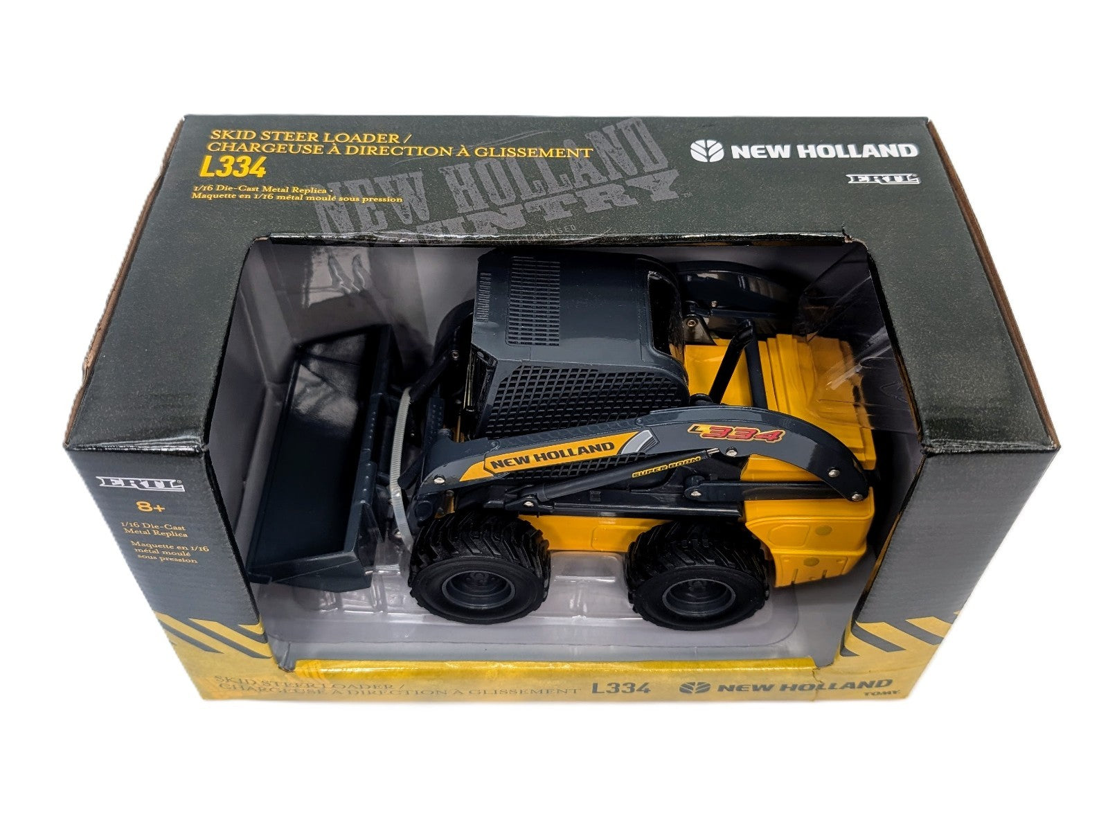 1/16 New Holland L334 Skidsteer Loader With Bucket.